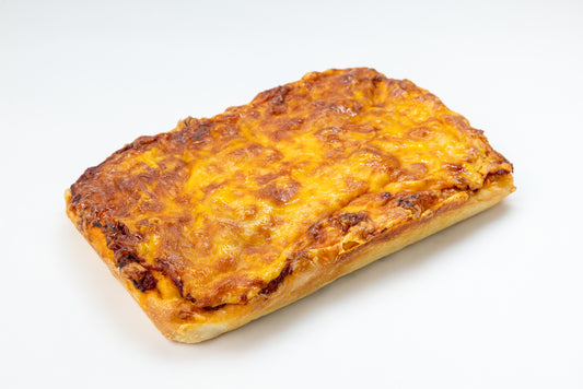 Cheesy rectangular pizza on a white background