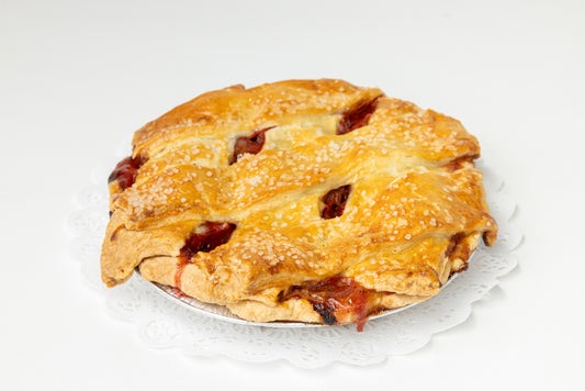Pastry with a lattice top on a white plate